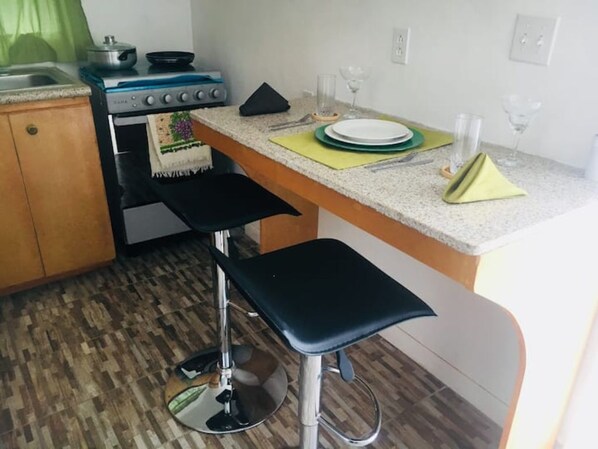 Fridge, microwave, cookware/dishes/utensils