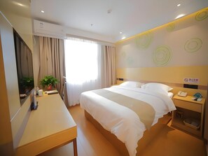 A hotel room with a bed, bedside table, and a desk. - Greentree Alliance Beijing Shunyi District Xiaoying Hotel (Shunyi)