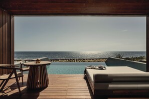 An infinity pool, sun loungers