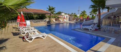 Outdoor pool, pool umbrellas, pool loungers