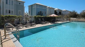 A swimming pool with lounge chairs and a metal ladder. - Private Pool, Easy Walk to Beach, 5 Bikes + Free Dolphin Cruise! (Santa Rosa Beach)