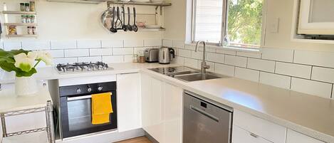 Fridge, microwave, toaster, cookware/dishes/utensils