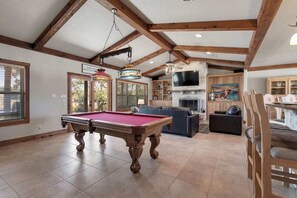 Smart TV, fireplace, table tennis, books