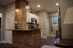 Fridge, microwave, oven, stovetop - 3 BR Home near DT Woodstock Square with Hot Tub & Arcade Games! (Woodstock)