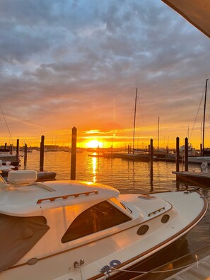 A marina with boats docked during sunset. - *SUMMER RENTAL*<br><br>Gorgeous, furnished 3 bedroom 1.5 bath w/ garage & private deck (Newport)