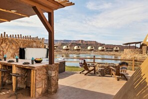 Outdoor dining - Perfect for A Romantic Getaway Bison Tipi On The Pond w/  1 King Bed, 2 Futons, Hot tub and an Outdoor Kitchen #40 (Virgin)