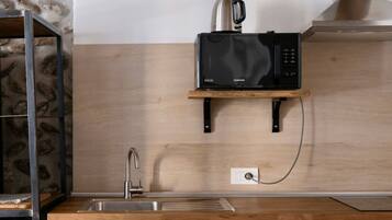 Fridge, microwave, toaster, cookware/dishes/utensils