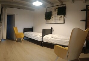 1 室のベッドルーム、旅行用ベビーベッド、WiFi (無料)、ベッドシーツ