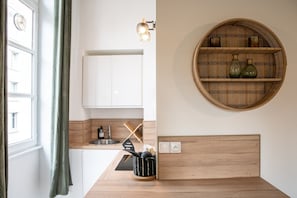 Fridge, microwave, coffee/tea maker, toaster