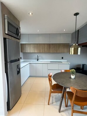 Fridge, microwave, coffee/tea maker, toaster