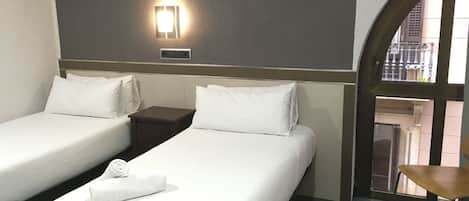 Twin Room | Premium bedding, down duvets, in-room safe, desk