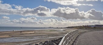 A spacious house in an ideal location, across the road from the beach.