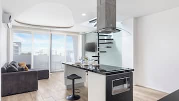 Penthouse | Living area | 38-inch Smart TV with digital channels