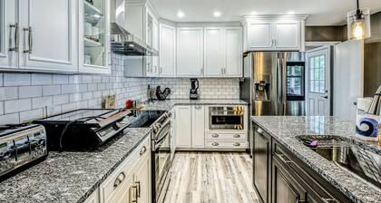 Lakefront Home with Private Dock, Hot Tub, Fireplace, & Central A/C - Free WiFi