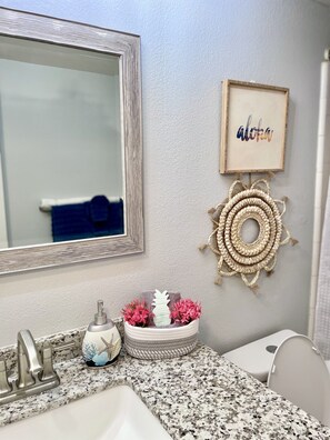 Combined shower/tub, hair dryer, towels, soap