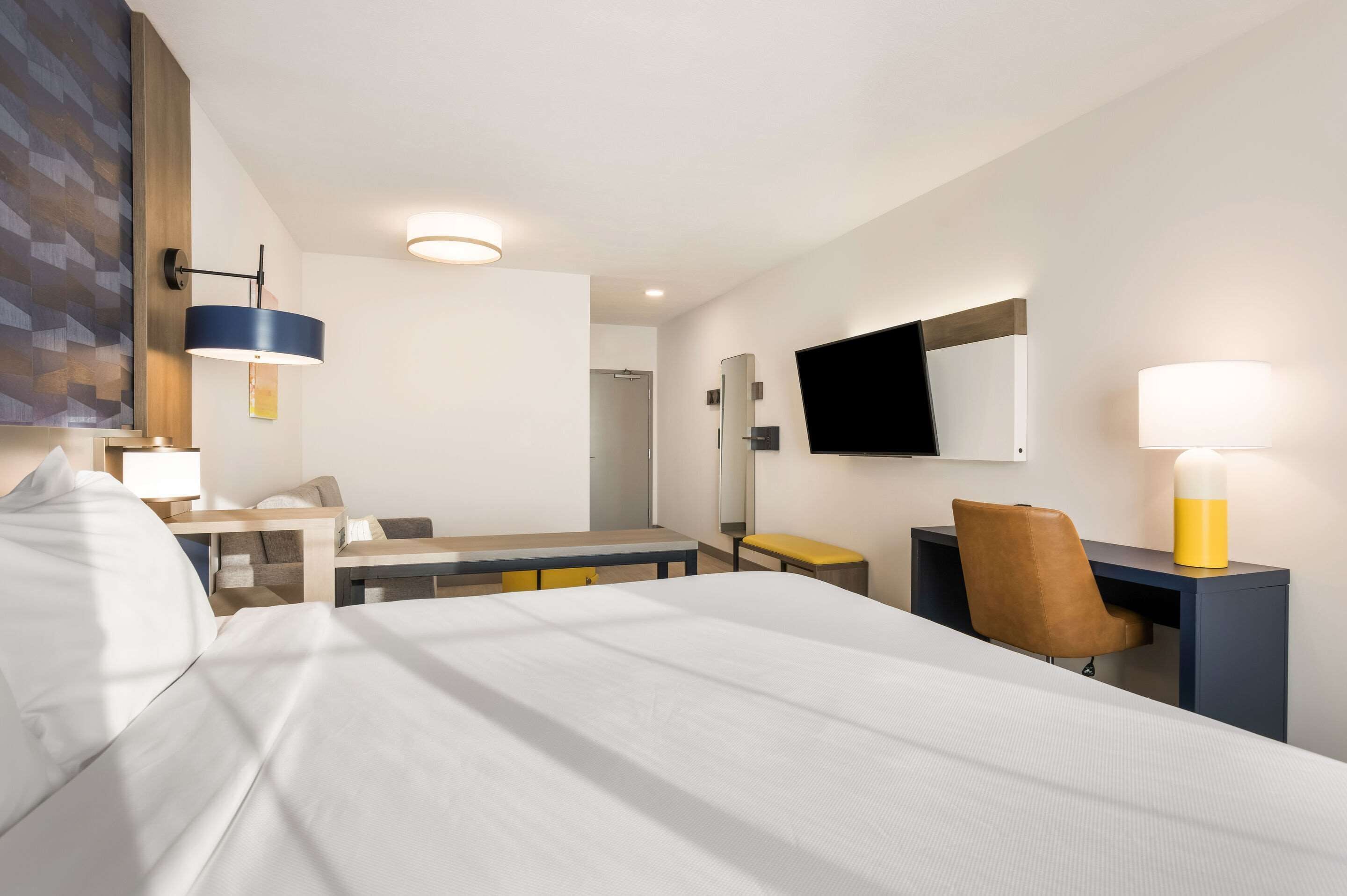 desk, laptop workspace, blackout curtains, iron/ironing board