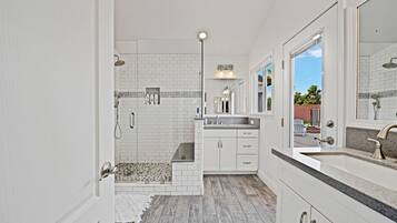 Combined shower/tub, hair dryer, towels, soap