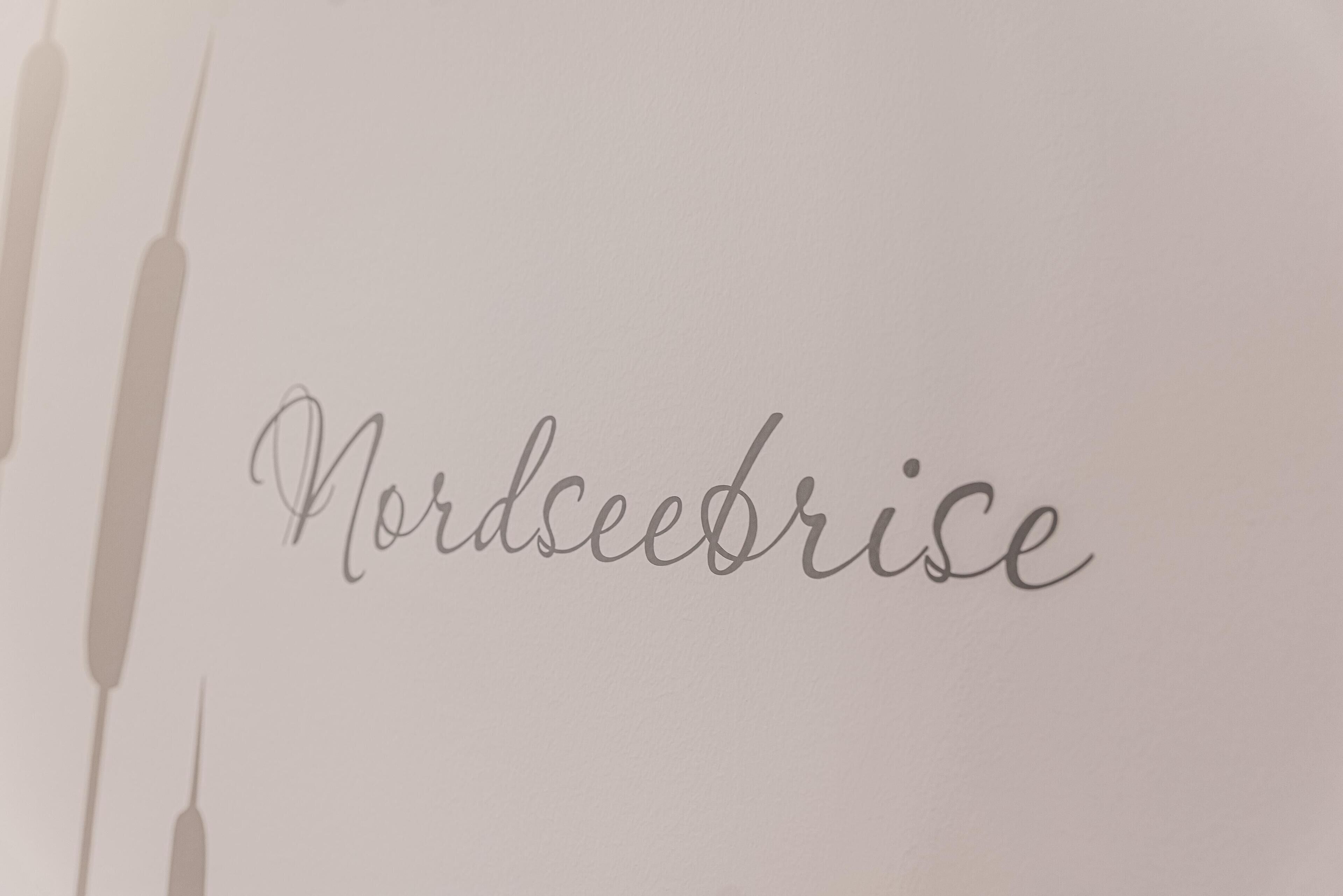 Une page sur laquelle le mot « Nordseebrise » est écrit en caractères cursifs.