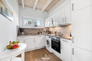 Fridge, microwave, oven, dishwasher - Vacation apartment Nordseebrise in the Nordseeresort - terrace, fireplace, infrared cabin, S (Büsum)