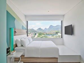 Habitación, 1 cama King size | Minibar, escritorio, espacio para trabajar con laptop y wifi gratis 