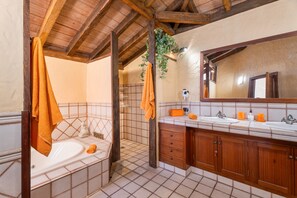 Bathtub, hair dryer, towels