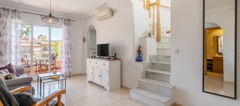 Holiday Apartment with Sea View, Shared Pool & Jacuzzi, Terraces, Garden & Wi-Fi
