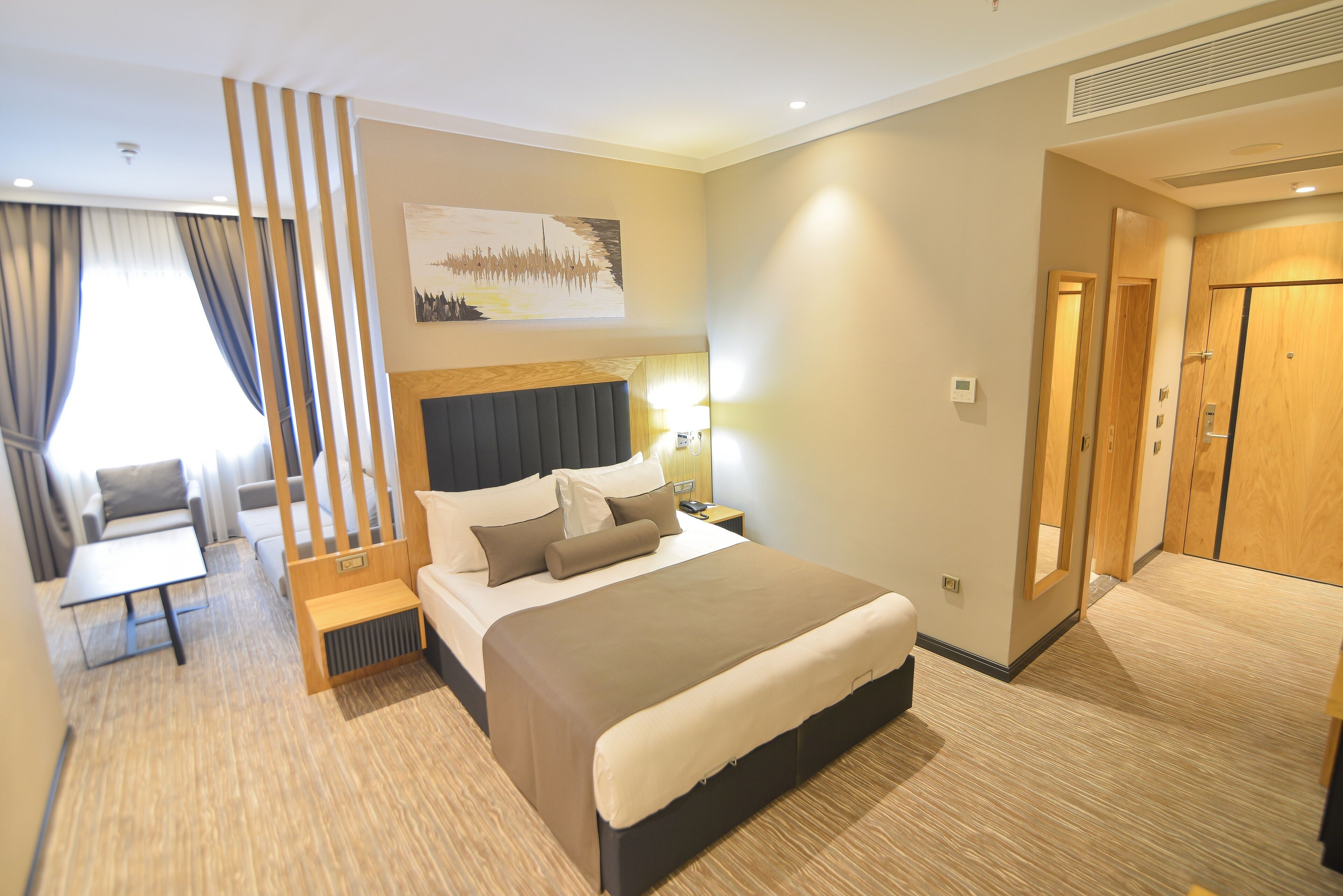 Deluxe Room | Premium bedding, minibar, desk, laptop workspace