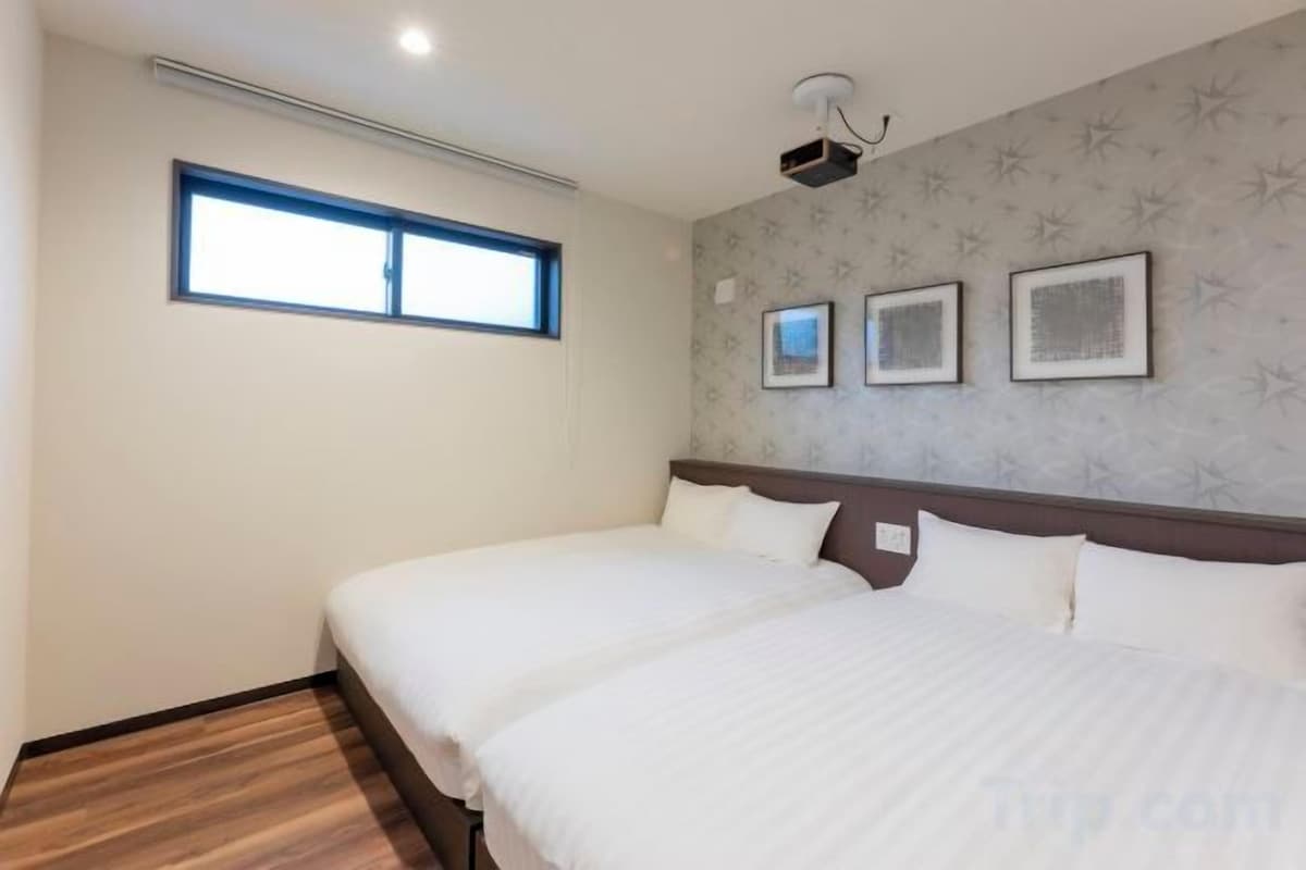 Desk, blackout drapes, WiFi (free), bed sheets