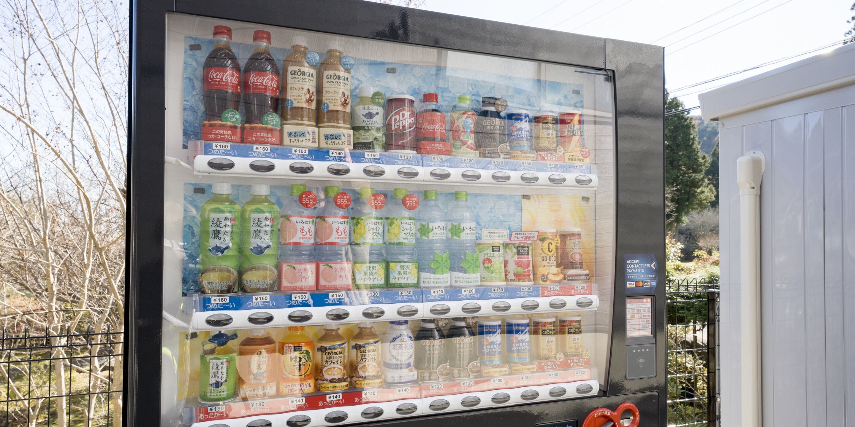 A vending machine with various beverages and snacks.