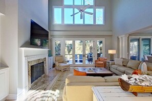 Flat-screen TV, fireplace, DVD player, stereo