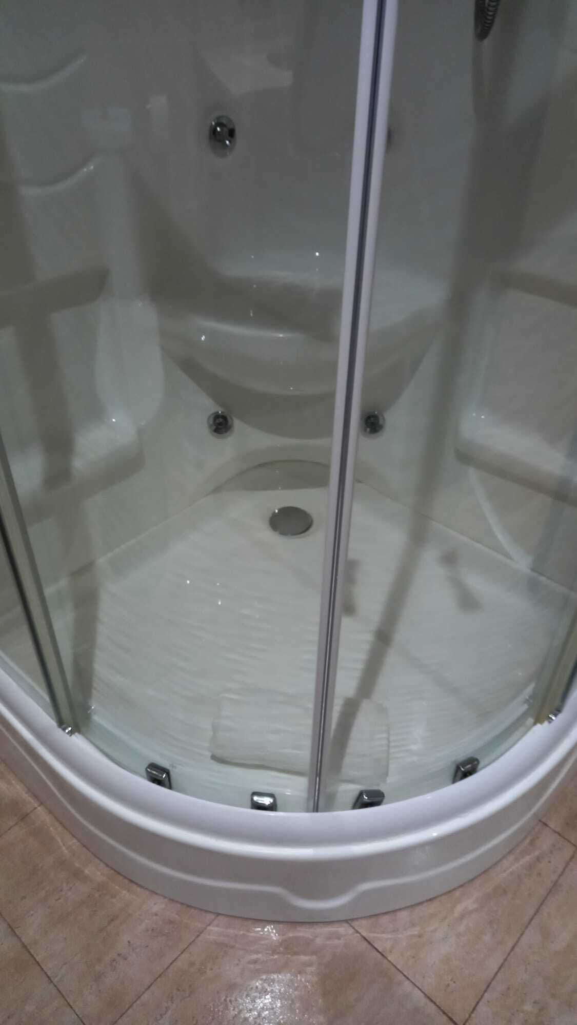 Shower, hydromassage showerhead, towels, soap