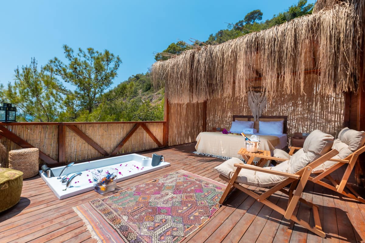 Deluxe suite, uitzicht op zee | Bubbelbad