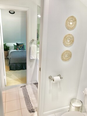 Combined shower/tub, hair dryer, towels, soap