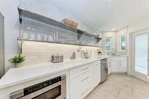 Fridge, microwave, dishwasher, coffee/tea maker