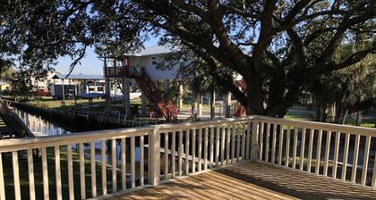 Beautiful Canal Front, Nautical Theme Home with downstairs outdoor TIki Bar