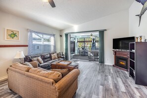 Smart TV, fireplace, table football, books