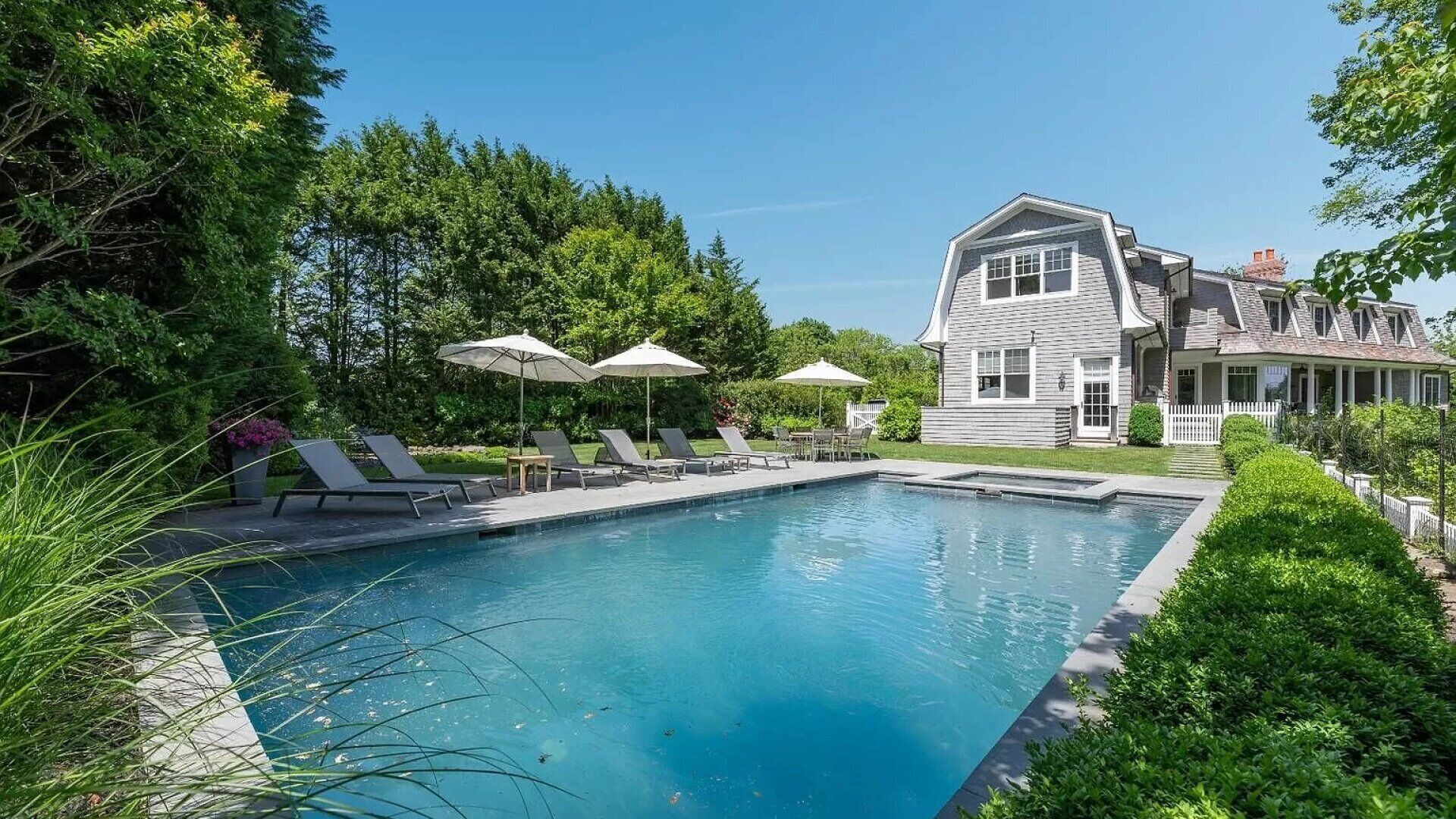 Majestic Dutch Colonial retreat sited on two acres of lush acreage,...