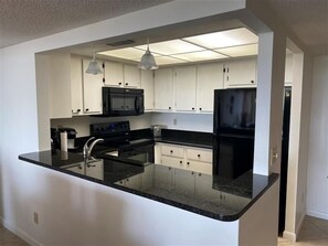 Unclassified image, 3 of 30, button