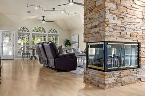 Smart TV, fireplace, books, offices