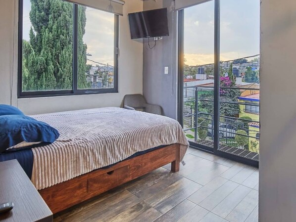 1 dormitorio, tabla de planchar con plancha, wifi gratis y ropa de cama