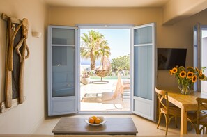 Luxury Villa, 3 Bedrooms, Private Pool, Sea View | Living area | 46-inch LED TV with cable channels, TV - Pink Freud Villas Santorini (Santorini)