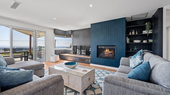 Smart TV, fireplace, books