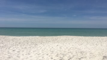 On the beach, sun loungers, beach towels