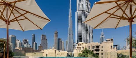 Outdoor pool, free cabanas, pool umbrellas