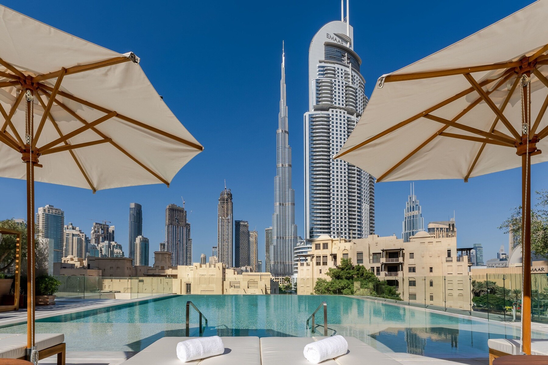 Outdoor pool, free pool cabanas, pool umbrellas