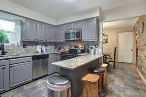 Fridge, microwave, oven, stovetop - Cozy Cabin Retreat Sleeps 12 w/ HotTub, Wi-Fi, FirePit minutes from Dollywood!! (Sevierville)