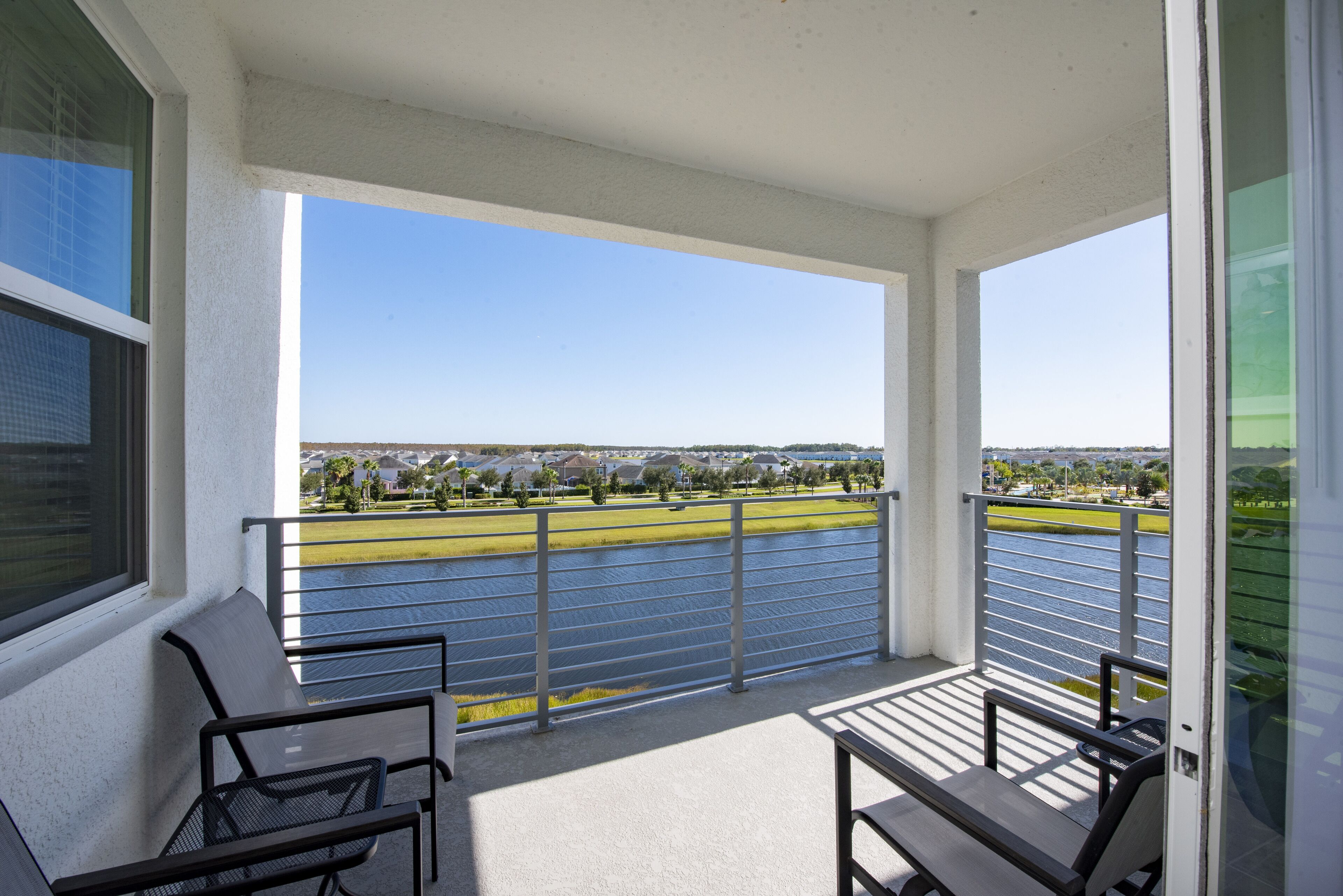 Luxury condo with relaxing  water view  close to theme parks and shopping.