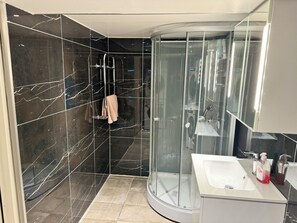 Shower, towels, soap, shampoo
