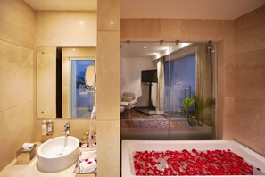 Presidential Suite with Private Terrace | Bathroom | Shower, hair dryer, bathrobes, slippers - Regenta Suites Gurugram, Sector 49 Sohna Road (Gurugram)