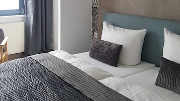 1 bedroom, desk, travel crib, bed sheets